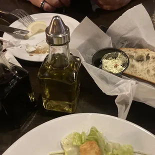 Dipping bread, balsamic and olive oil, and herb butter