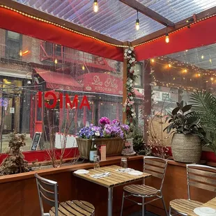 a restaurant with tables and chairs