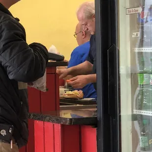 a man and a woman at a counter