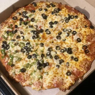 Thin crust build your own 14" pizza-pepperoni, onion, black olives &amp; green peppers on half