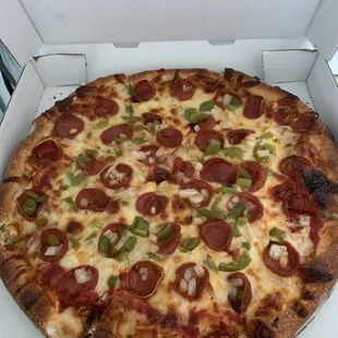 Pepperoni onion green pepper well done.