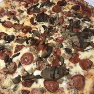 Medium with pepperoni, sausage and mushrooms with butter/parmesan/garlic crust