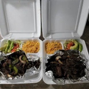 two takeout containers of food