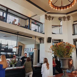 a group of people at the bar