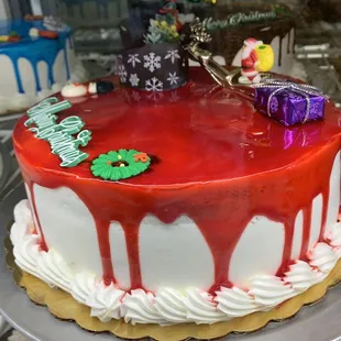 a red cake with white icing