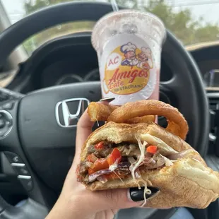 Strawberry Banana smoothie, Onion Rings, and Philly cheesesteak