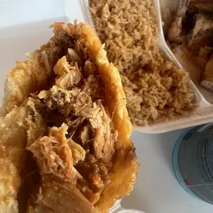 a chicken sandwich and rice