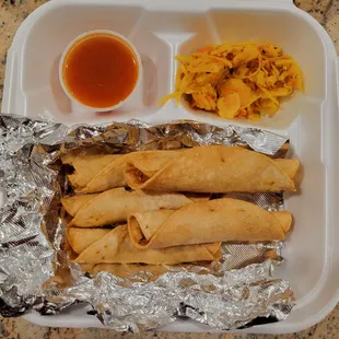 Taco Dorados with marinated cabbage and red salsa