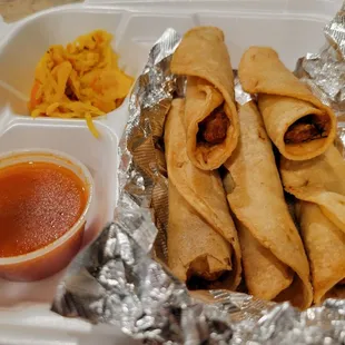 Taco Dorados with marinated cabbage and red salsa