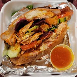 Pan Con Pollo with tomato consommé dipping sauce