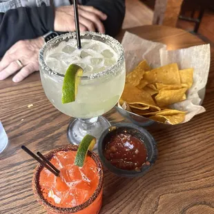 Chips and salsa with Cadillac Margarita and Chili Mango Margarita