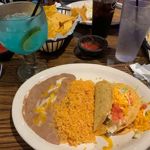 Two taco lunch special- one beef and one chicken. Coconut margarita for the drink. All good!