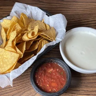 Complimentary chips and salsa plus a large cheese dip. The dip tasted like melted cream cheese - Creamy but not much flavor.