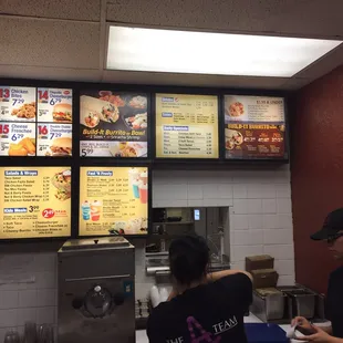 menus on the wall of a restaurant