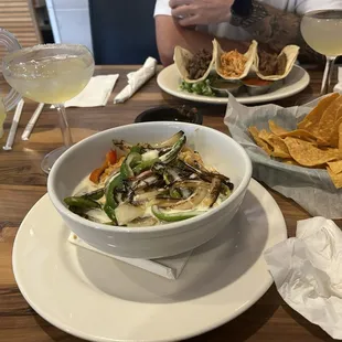 Fajita bowl. Grilled veggies on top of a bed of Mexican rice and beans topped with queso blanco. Delicious! Grilled chicken Fajita Bowl
