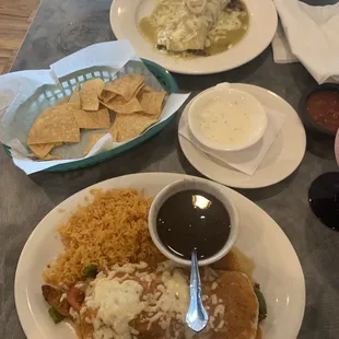Top- Steak Burrito (with tomatillo sauce)  Bottom- Burrito chicken fajita (with rice and black beans)