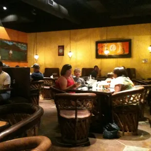 a group of people sitting at a table