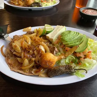 Yummy Carne Asada, coked perfectly! That's hard to do with skirt steak.