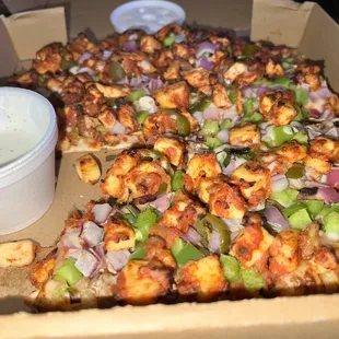 Paneer Pizza on bottom chillies Chili Chicken Pizza on top