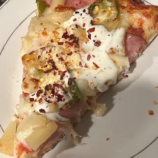 Ham and Hawaiian Pineapple Pizza with jalapeño .ranch pepper crumbs an Parmesan cheese