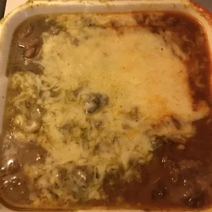 Mexican bean plate with half chile colorado and half chile verde