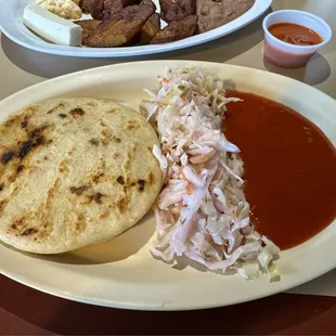 Pupusas with side of beans and plantains