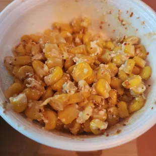 Elote. Its basically corn drenched in too much lime Juice.