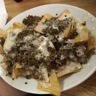 Beef (ground beef) nachos - basic but tasty. Order the extras if you expect them, like sour cream and onions.