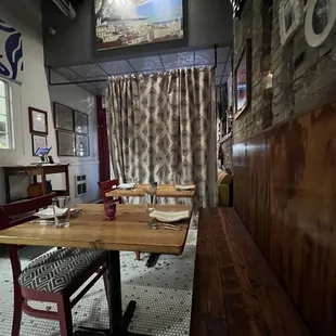 a table and chairs in a restaurant