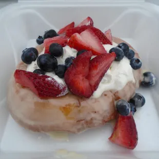 Giant fresh fruit donut.