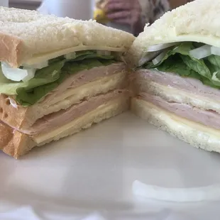 The Hoss. Turkey, Swiss cheese, lettuce, onion, and mayonnaise.
