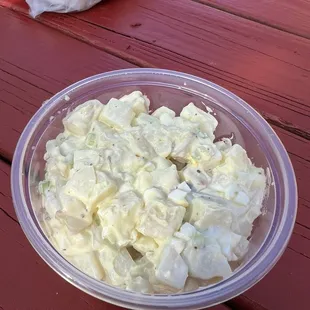 Potato Salad. Looks and taste, homemade, a little bland, could use more seasoning and spice.