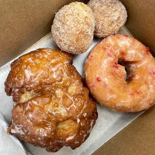 Apple fritter, strawberry donut, 2 holes
