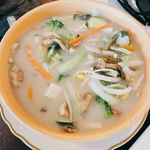 a bowl of soup on a plate