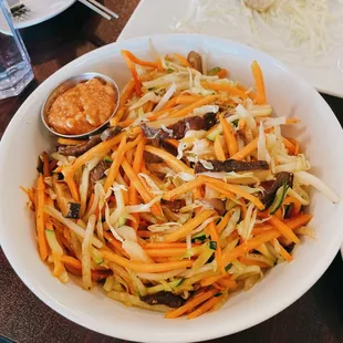 a bowl of food on a table