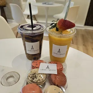 Blueberry and mango smoothies with assortment of macaroons