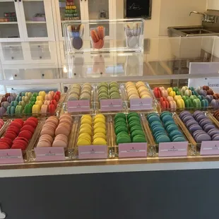 a display of colorful macarons