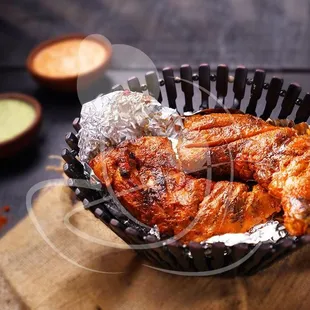 a basket of chicken wings