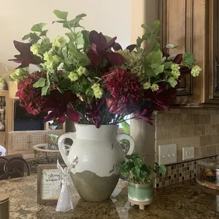 Kitchen. A bouquet he put together.