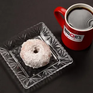 Powdered donut with locally roasted Baxter's coffee.