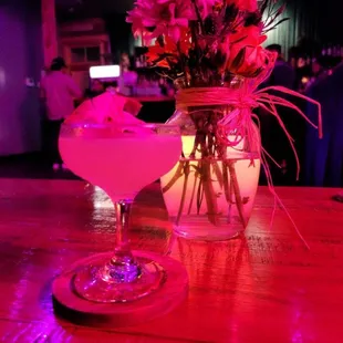 a cocktail in a glass on a table