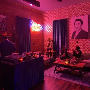 a man and a woman sitting in a living room