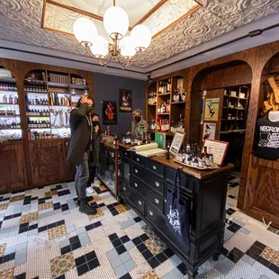 two men in a liquor shop