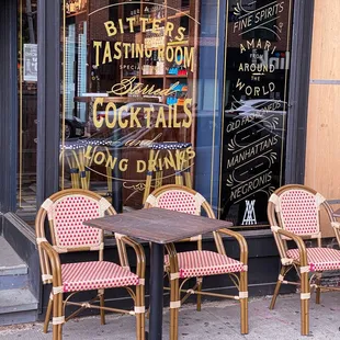 a table and chairs outside a restaurant