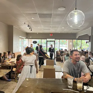 a group of people sitting at a table