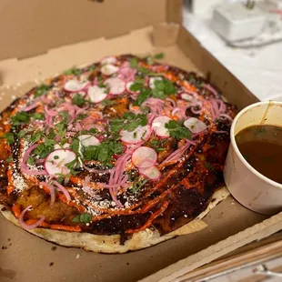 Birria pizza with consommé