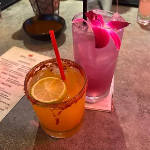Purple collins and passion fruit margarita