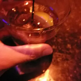 a person holding a drink