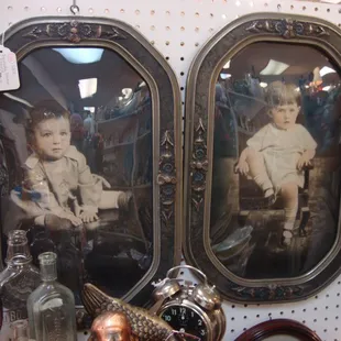 A nice matched pair of antique art deco style frames &amp; photos.