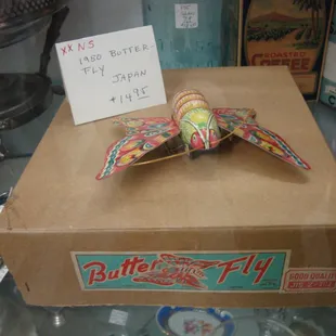 An awesome metal Japanese toy from the 50s - a butterfly with the original box - cool!